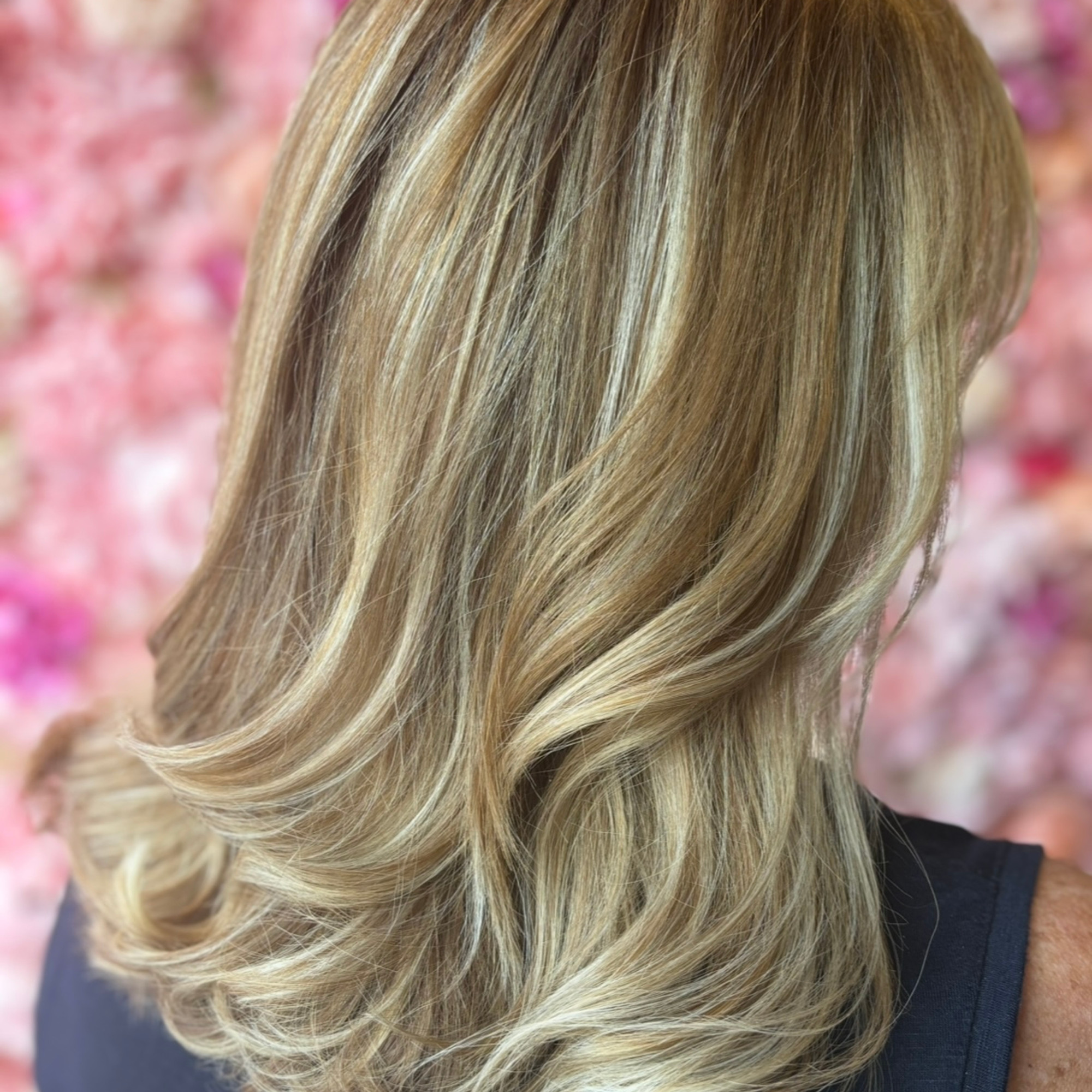 Blonde layered balayage styling by Vaffi Hair Salon on Danforth Ave, Toronto